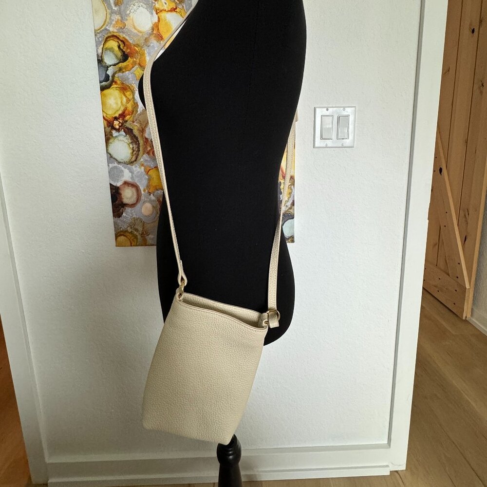 From Quince: Small Cream colored Crossbody for your phone and keys